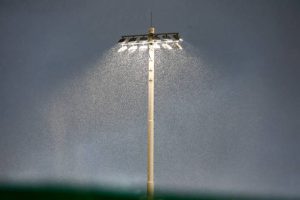 baseball field lights in the rain
